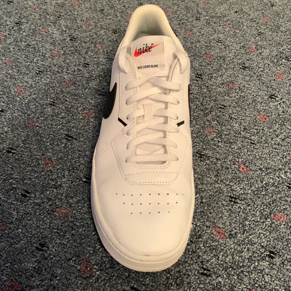 Nike white with black swoosh